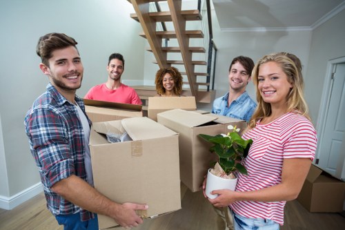 House removals team working in Upperwalthamstow residential street