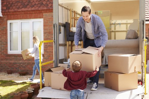 Professional office removals team handling workplace equipment