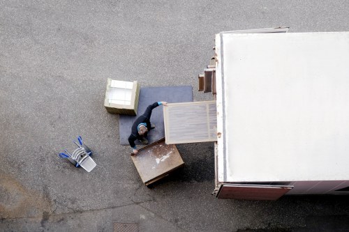 Small removals team loading boxes for a local move in Upperwalthamstow